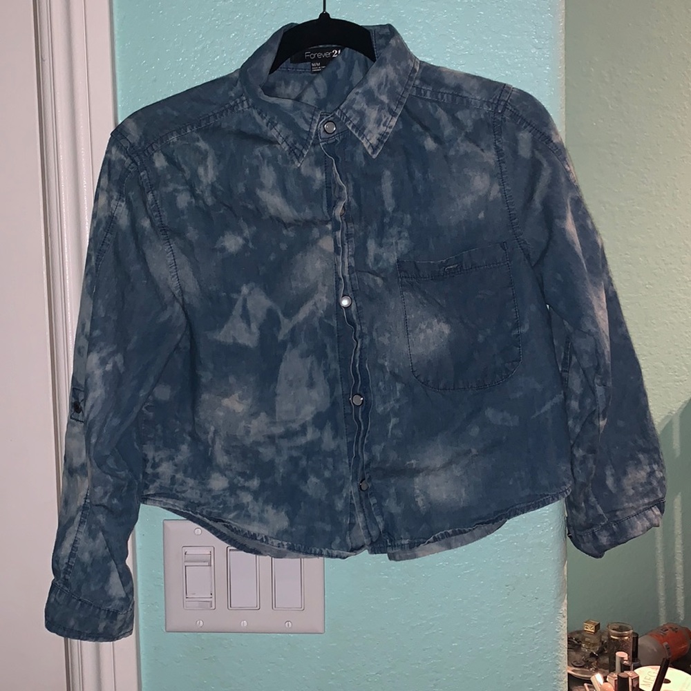 Button down  bleached shirt second to last button doesn’t clasp